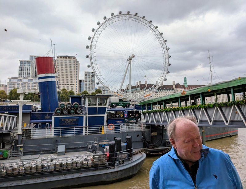 Ken and the London Eye. It was very windy.