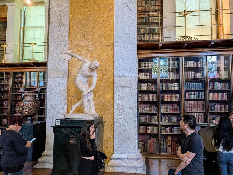 Discus thrower and Victorian library