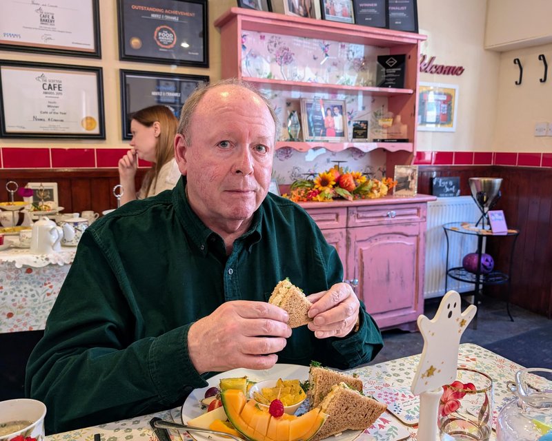 Ken having a sandwich at Nooks and Crannies