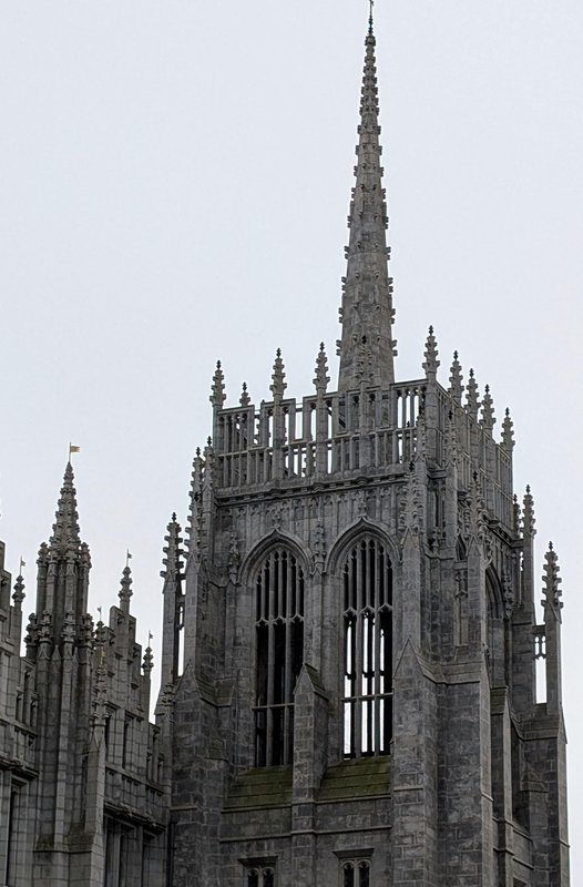A tower, very delicate for a huge granite building