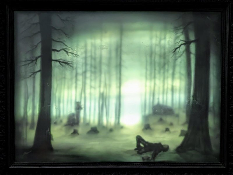 A glass sculpture made of layers of frosted glass, beautiful in person